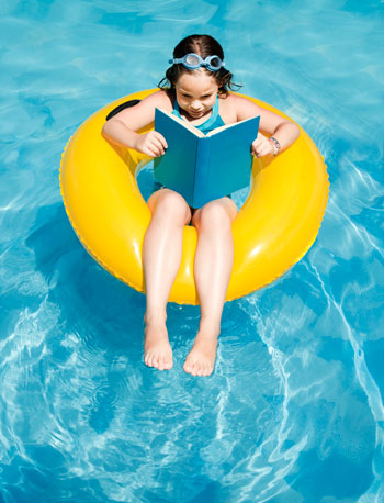 girl reading during summer
